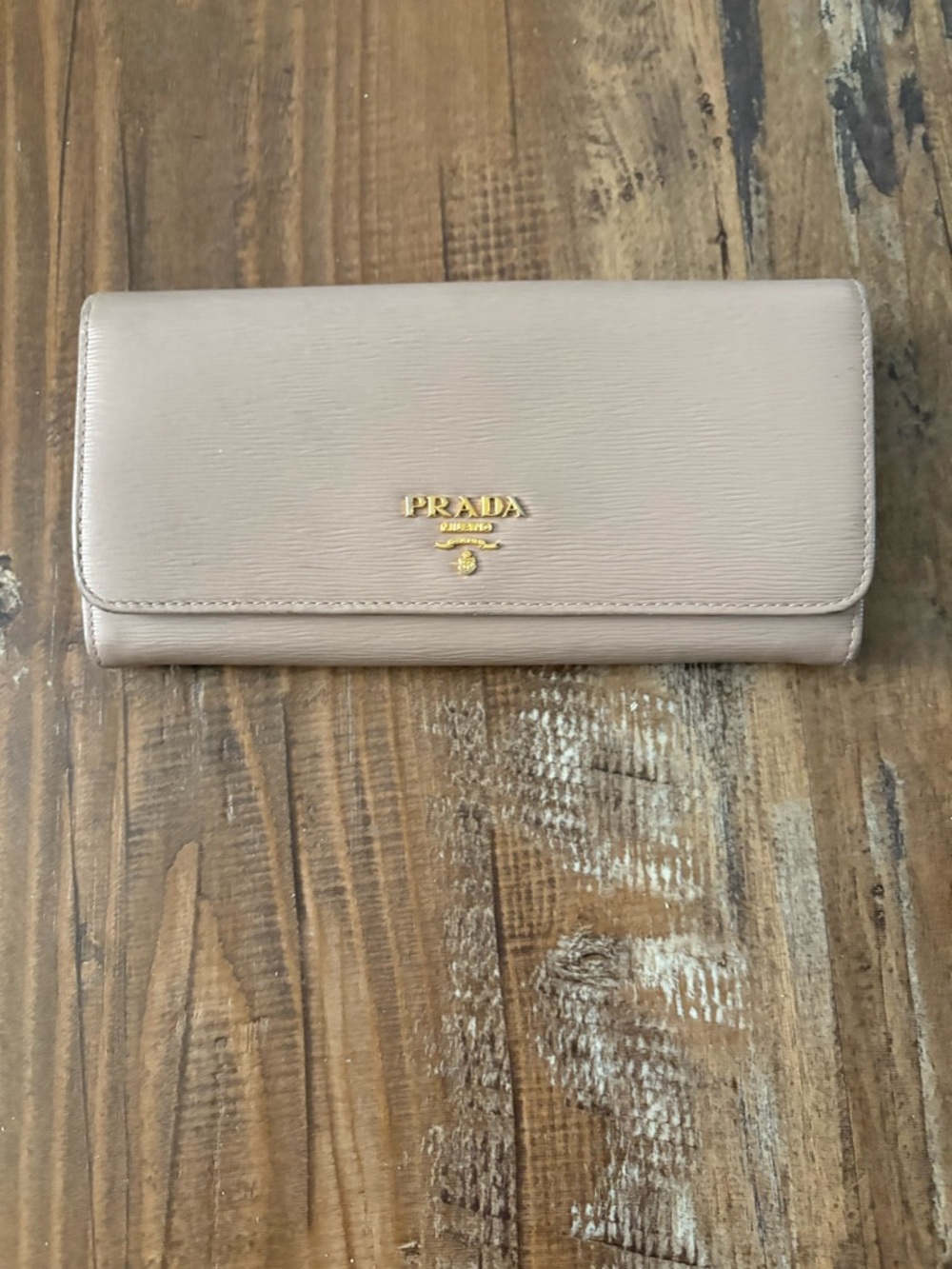 Prada Leather Continental Wallet in beige with Gold Hardware